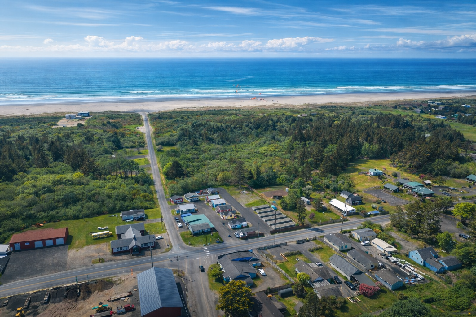 Aerial view of Ocean Spray Beach Resort and surrounding coastline