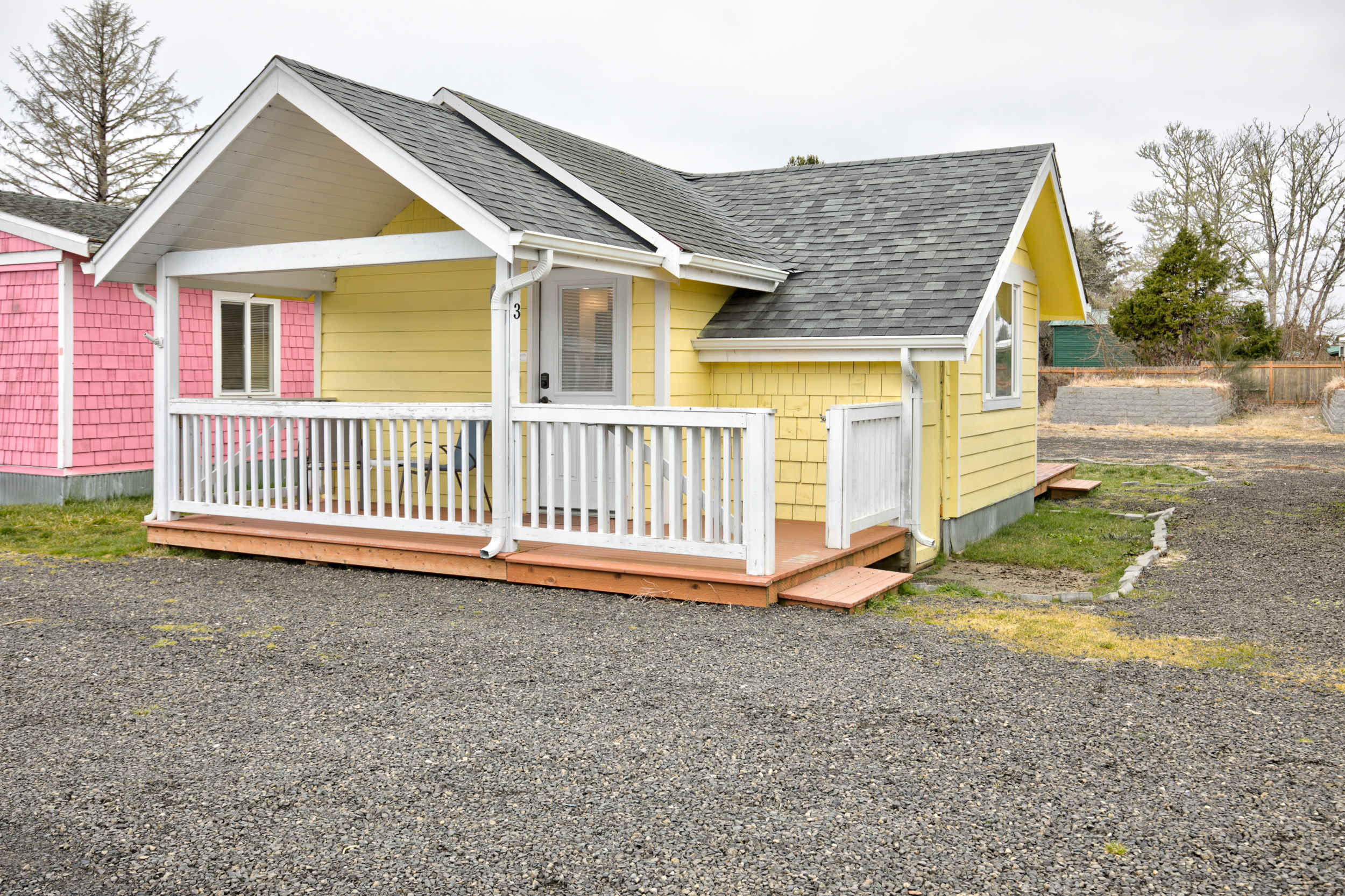 Cottage 3 exterior — sunny yellow cottage